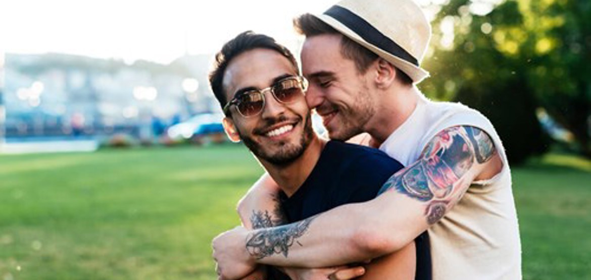 Two men hugging