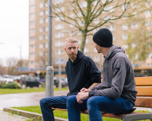 Two men talking 