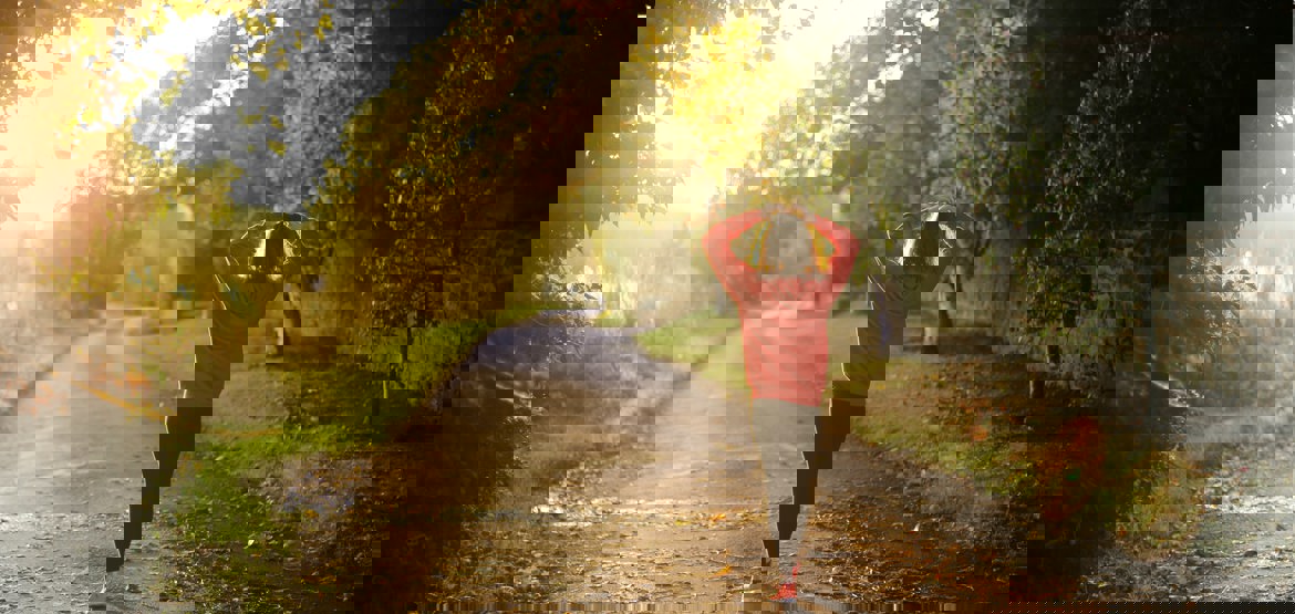 Woman walking in a forest