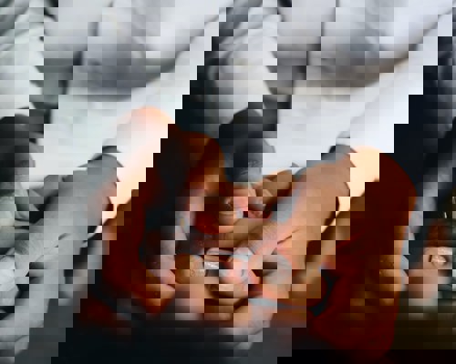 Hands holding